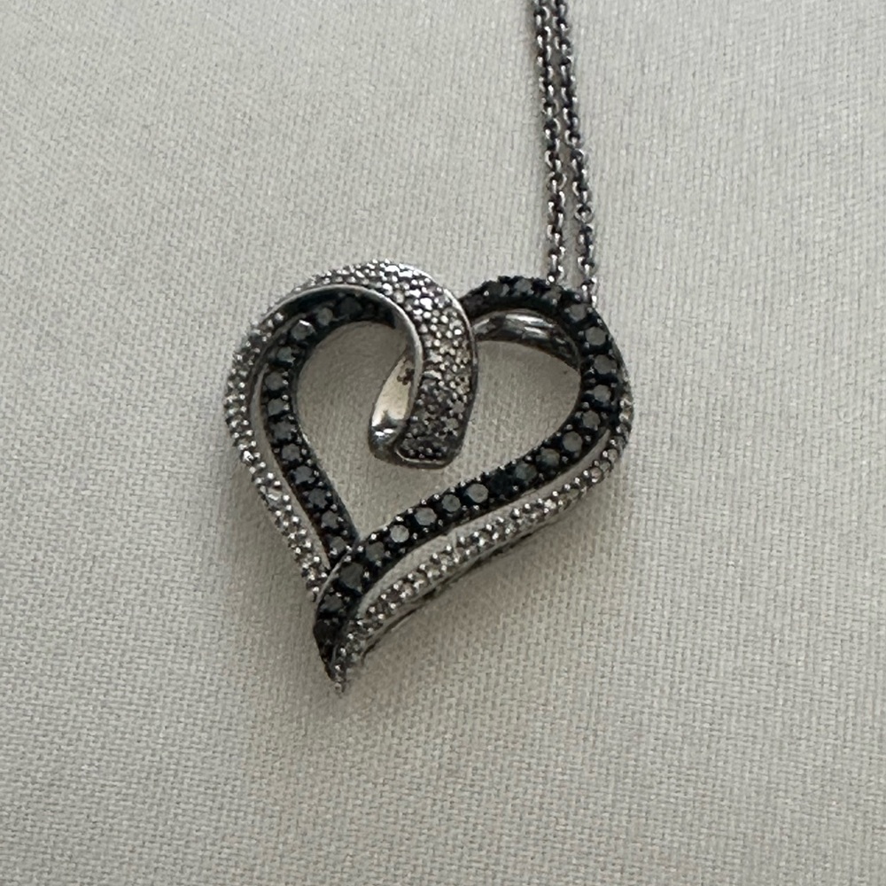 Beautiful sterling silver .925 black diamond and white sapphire heart pendant